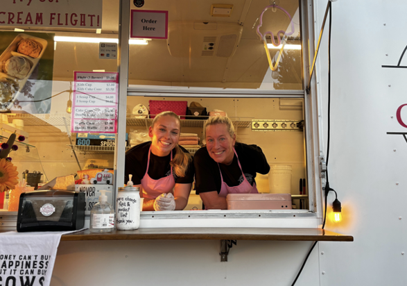 The kind ladies from Crown Creamery serving ice cream to their customers.