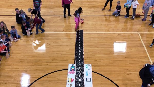 Beiriger students lead their floats down “34th Street” in the Wadsworth gymnasium.