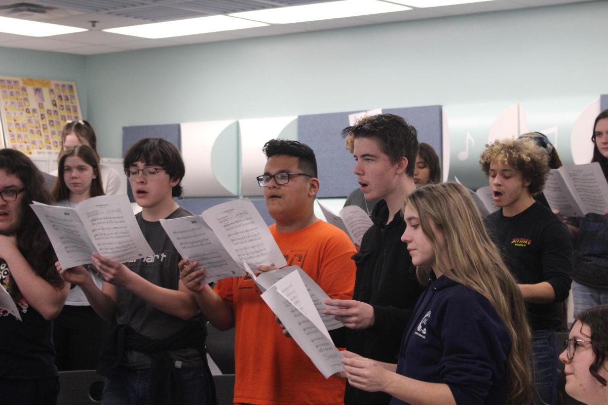 High school choir students practice for an upcoming concert.