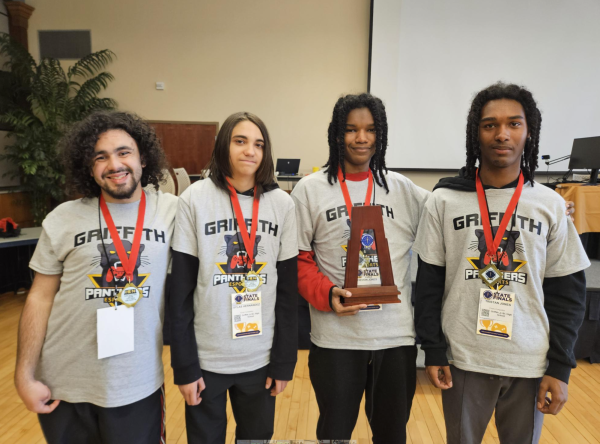 Elijah Bernhardt, Silas Hernandez, Tre Jones, and Tristan Jones with their awards after the competition.