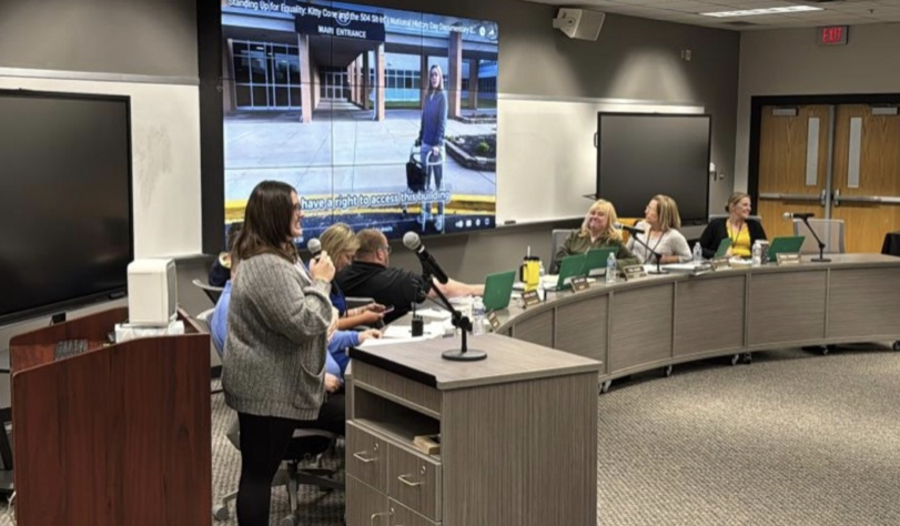 Natalie Watkins presents her documentary at her Panther Spotlight at the school board meeting on May 8.