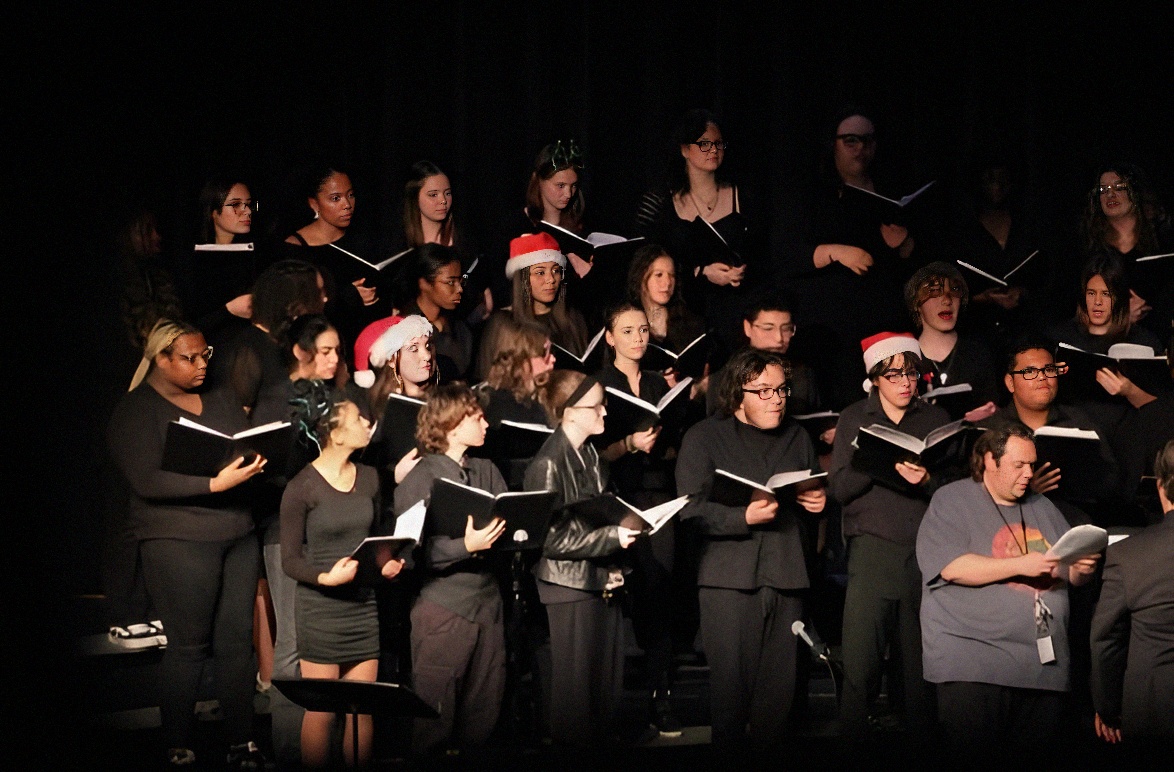 The choir sings at their winter concert.