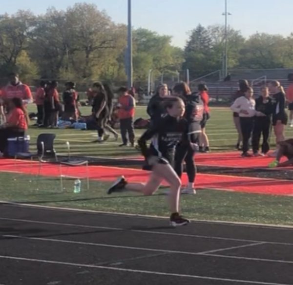 Hope Lyons running in the 400 meter at 5:00 at Calumet High School
