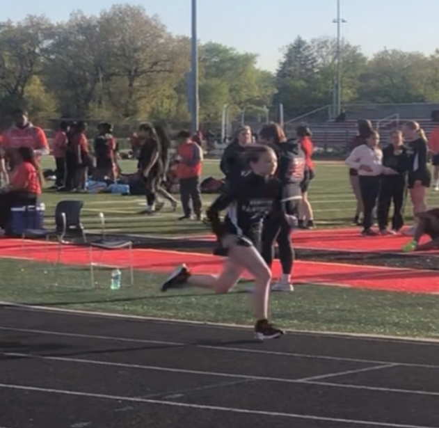 Hope Lyons running in the 400 meter at 5:00 at Calumet High School