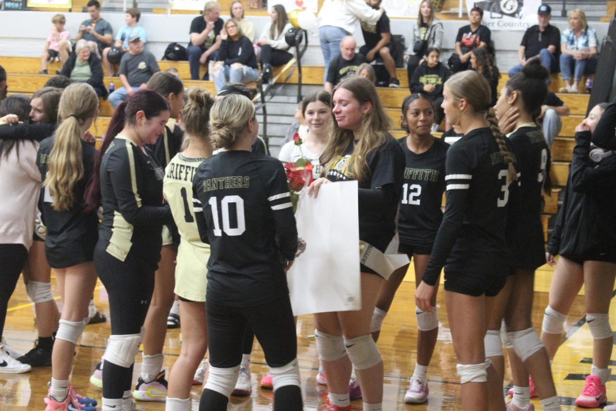 Captain Kaelin Bergdahl reacts emotionally as teammates celebrate her final season during Senior Night on September 29.