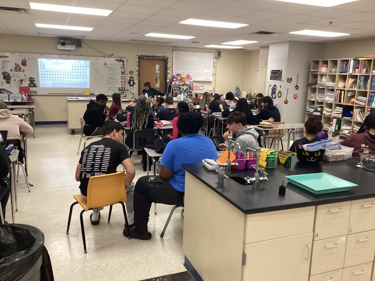 Science teacher Ms. KV's advisory classroom full of students from two Advisory classes. 