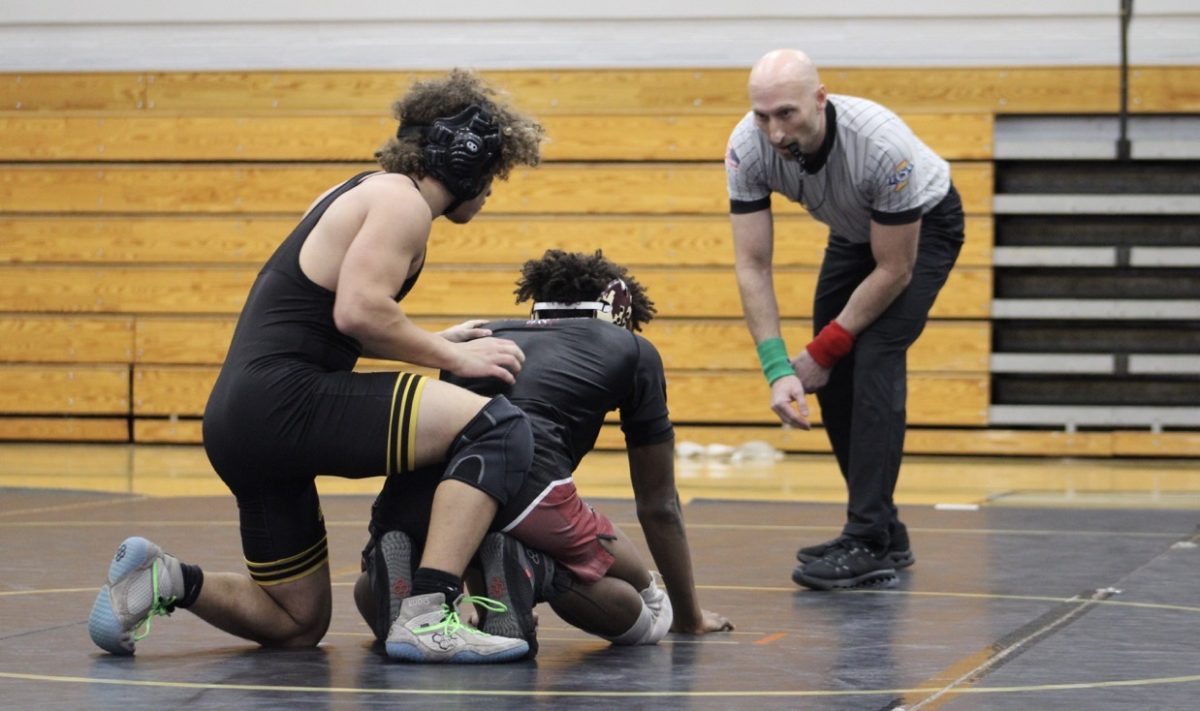 Griffith Senior Nicholas Grahovic pins a Calumet wrestler in the Griffith Jr./Sr. High Main Gym.